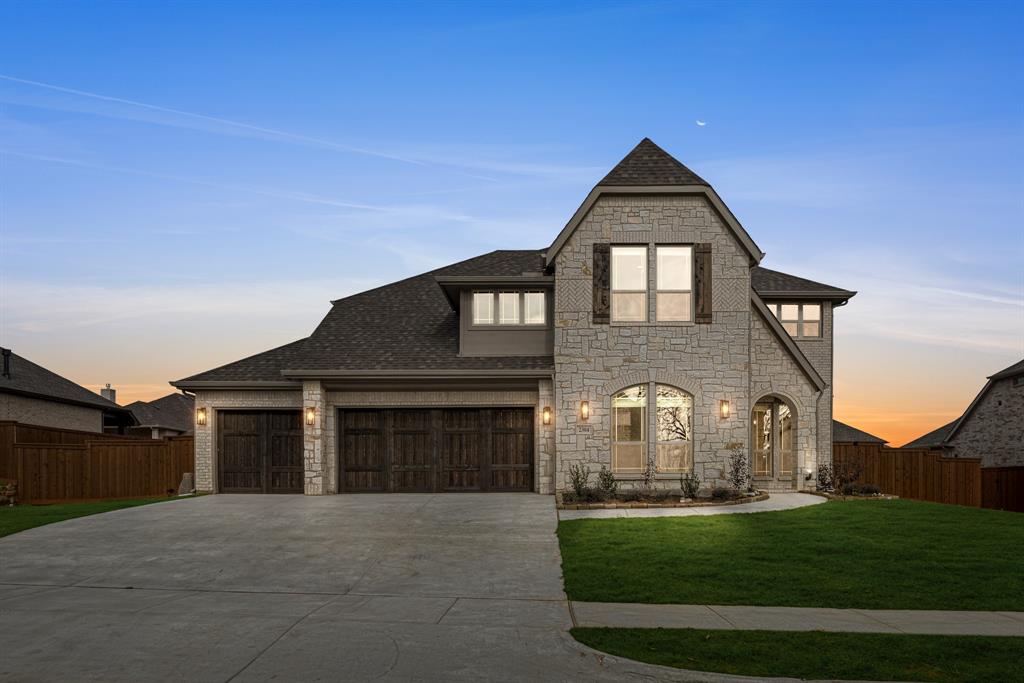2304 Prosper Way Mansfield, TX 76063 - Photo 1 of 39 a front view of a house with a yard