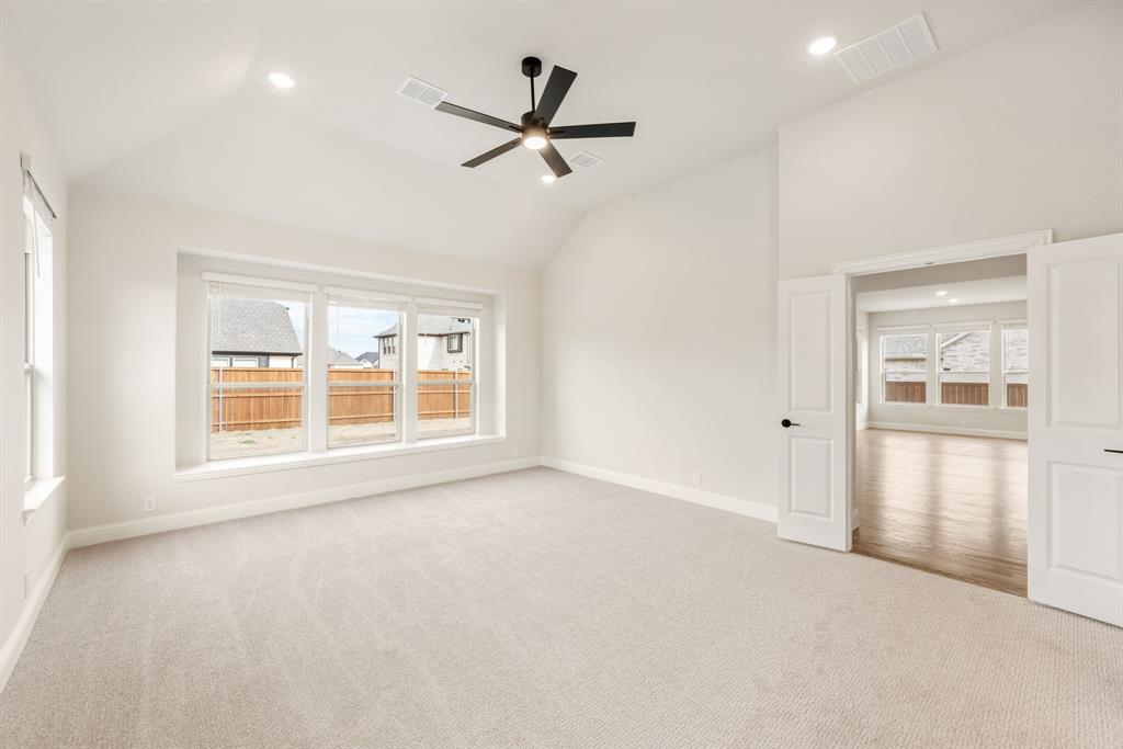 2304 Prosper Way Mansfield, TX 76063 - Photo 21 of 39 a view of an empty room with a window