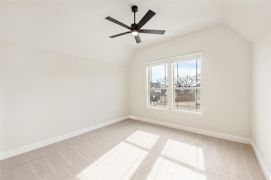 2304 Prosper Way Mansfield, TX 76063 - Photo 31 of 39 a view of a livingroom with a ceiling fan and window