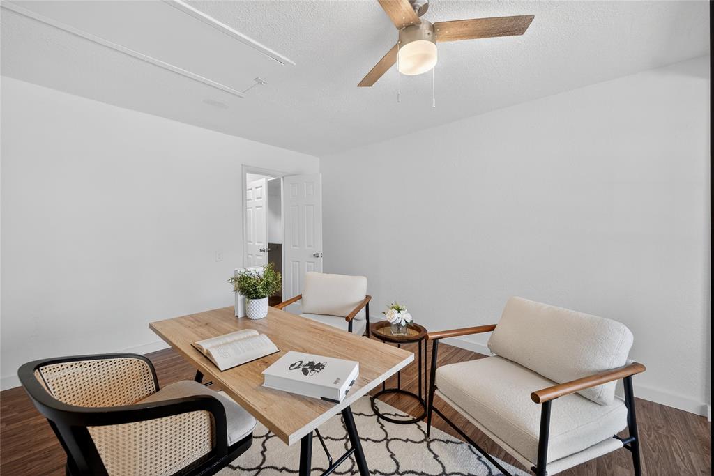 3417 Haltom Road Haltom City, TX 76117 - Photo 14 of 31 a living room with furniture and a potted plant