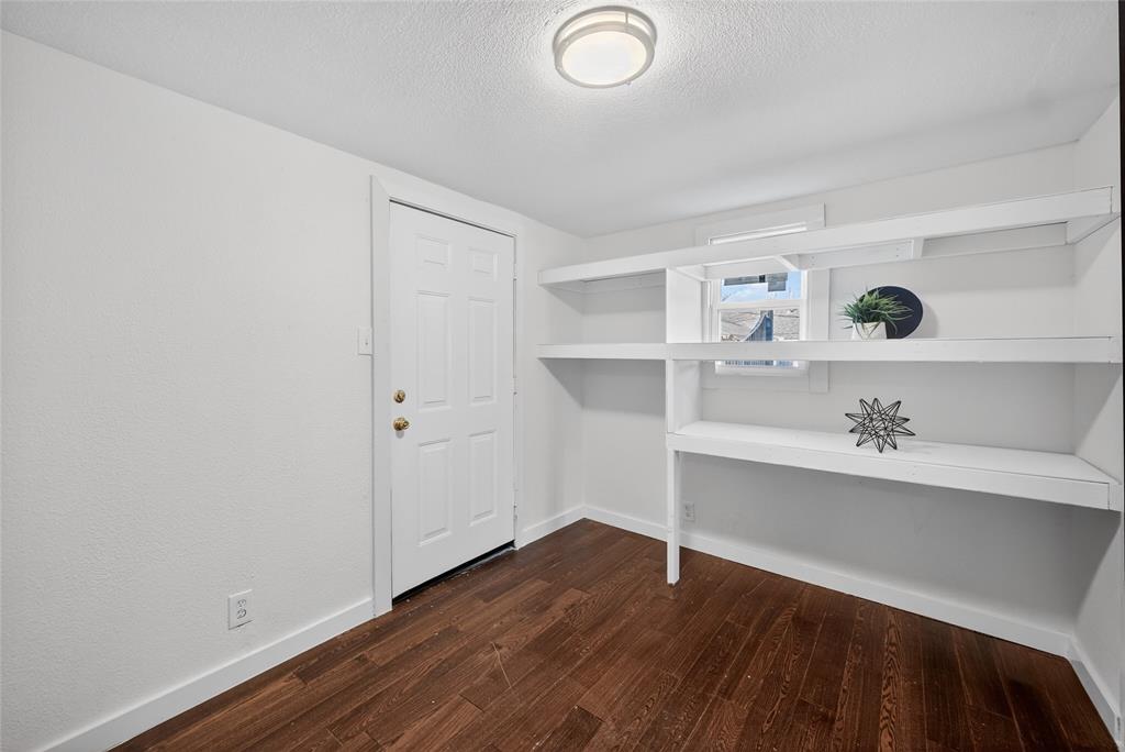 3417 Haltom Road Haltom City, TX 76117 - Photo 20 of 31 a view of workspace with wooden floor