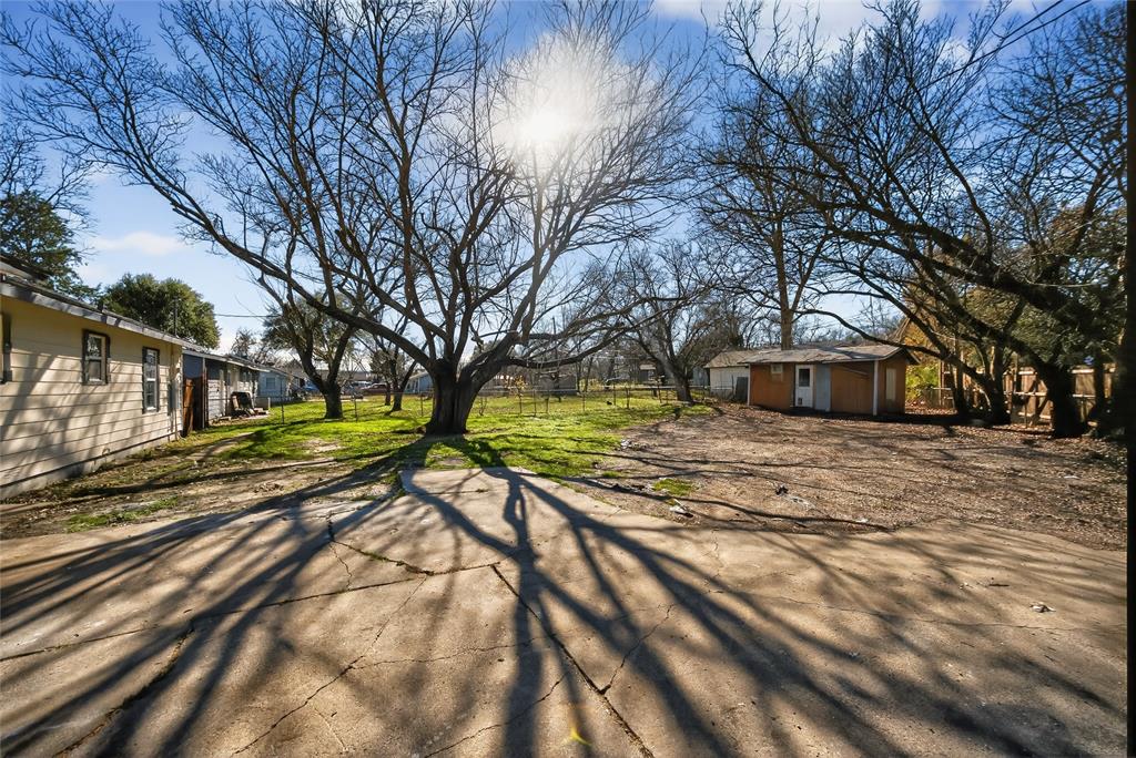 3417 Haltom Road Haltom City, TX 76117 - Photo 29 of 31 a view of a yard with plants and trees