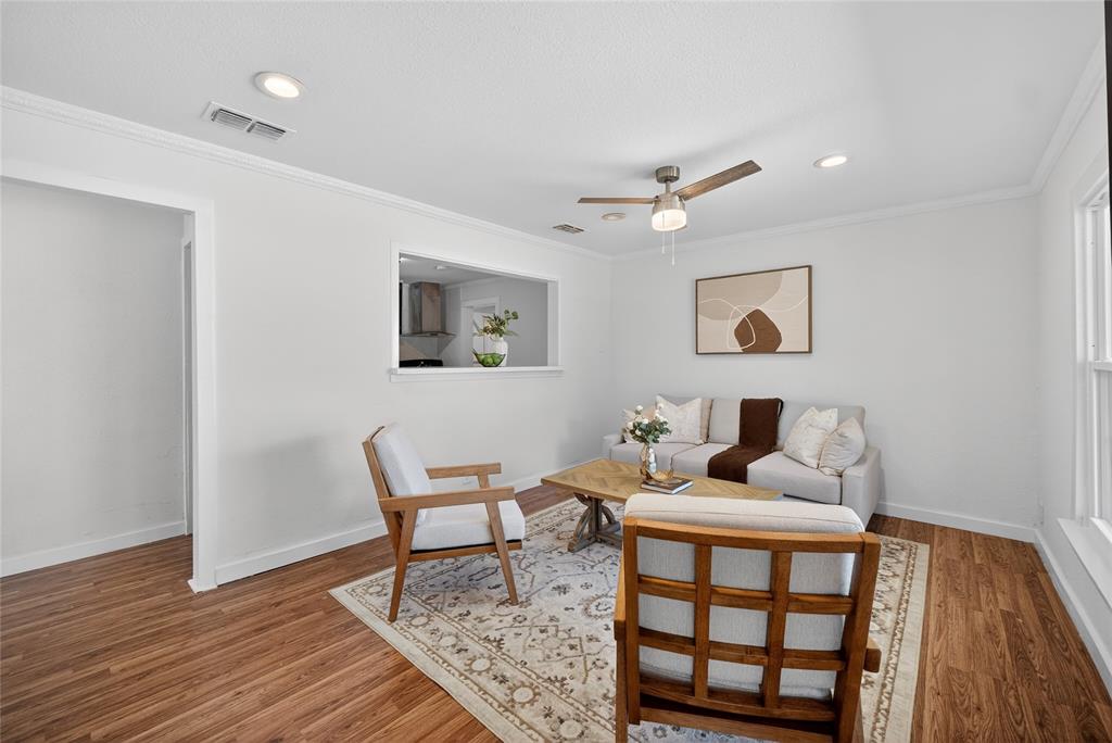 3417 Haltom Road Haltom City, TX 76117 - Photo 6 of 31 a living room with furniture and wooden floor