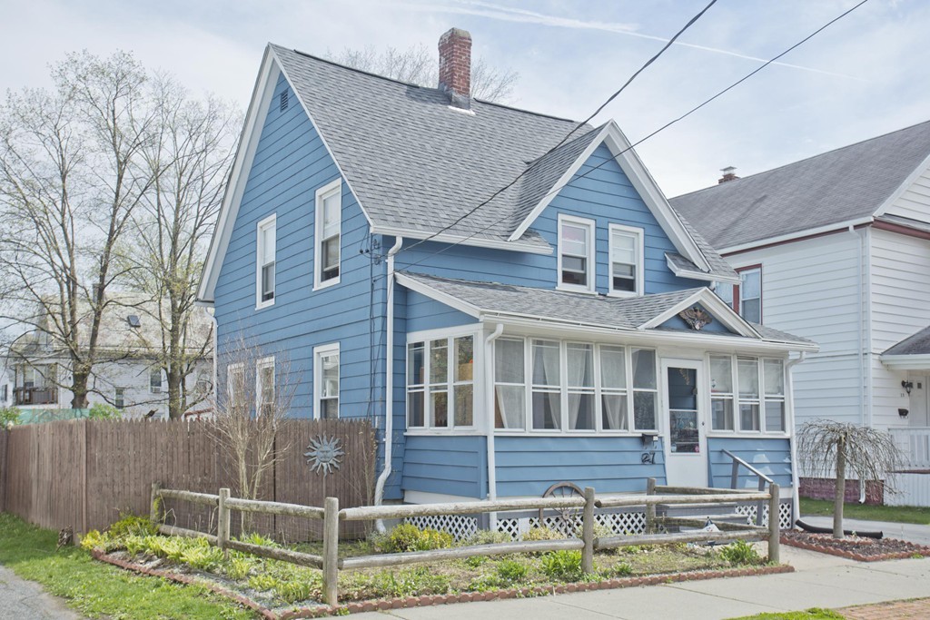 27 Governor Street Springfield, MA 01104 - Photo 1 of 18 a front view of a house with a yard