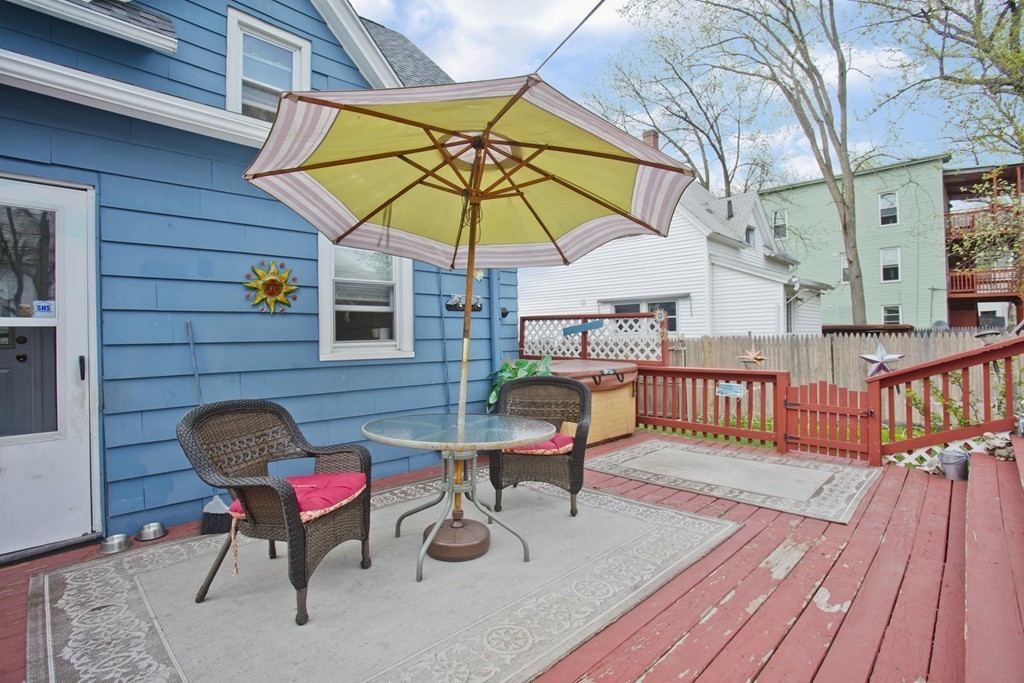 27 Governor Street Springfield, MA 01104 - Photo 14 of 18 a view of a chairs and table in the balcony