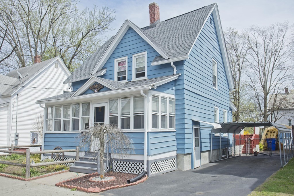 27 Governor Street Springfield, MA 01104 - Photo 17 of 18 a front view of a house with a garage