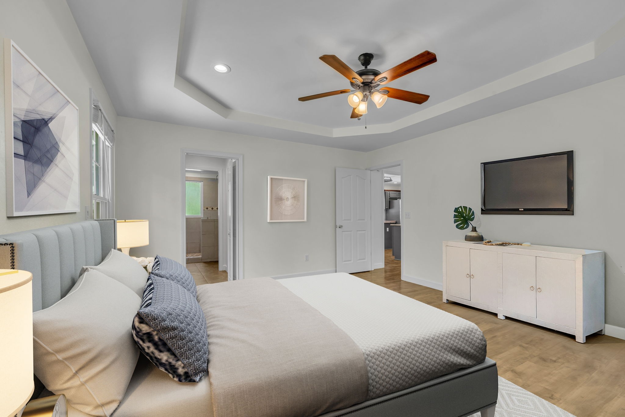 7707 Chester Road Fairview, TN 37062 - Photo 15 of 26 a bedroom with a bed and a flat screen tv
