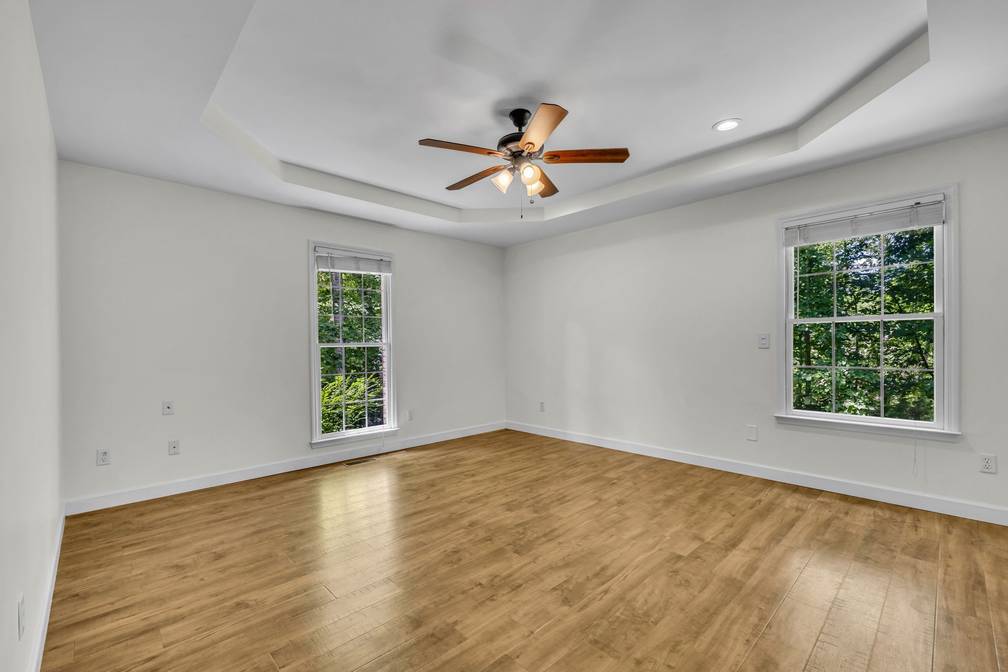 7707 Chester Road Fairview, TN 37062 - Photo 16 of 26 wooden floor in an empty room with a window