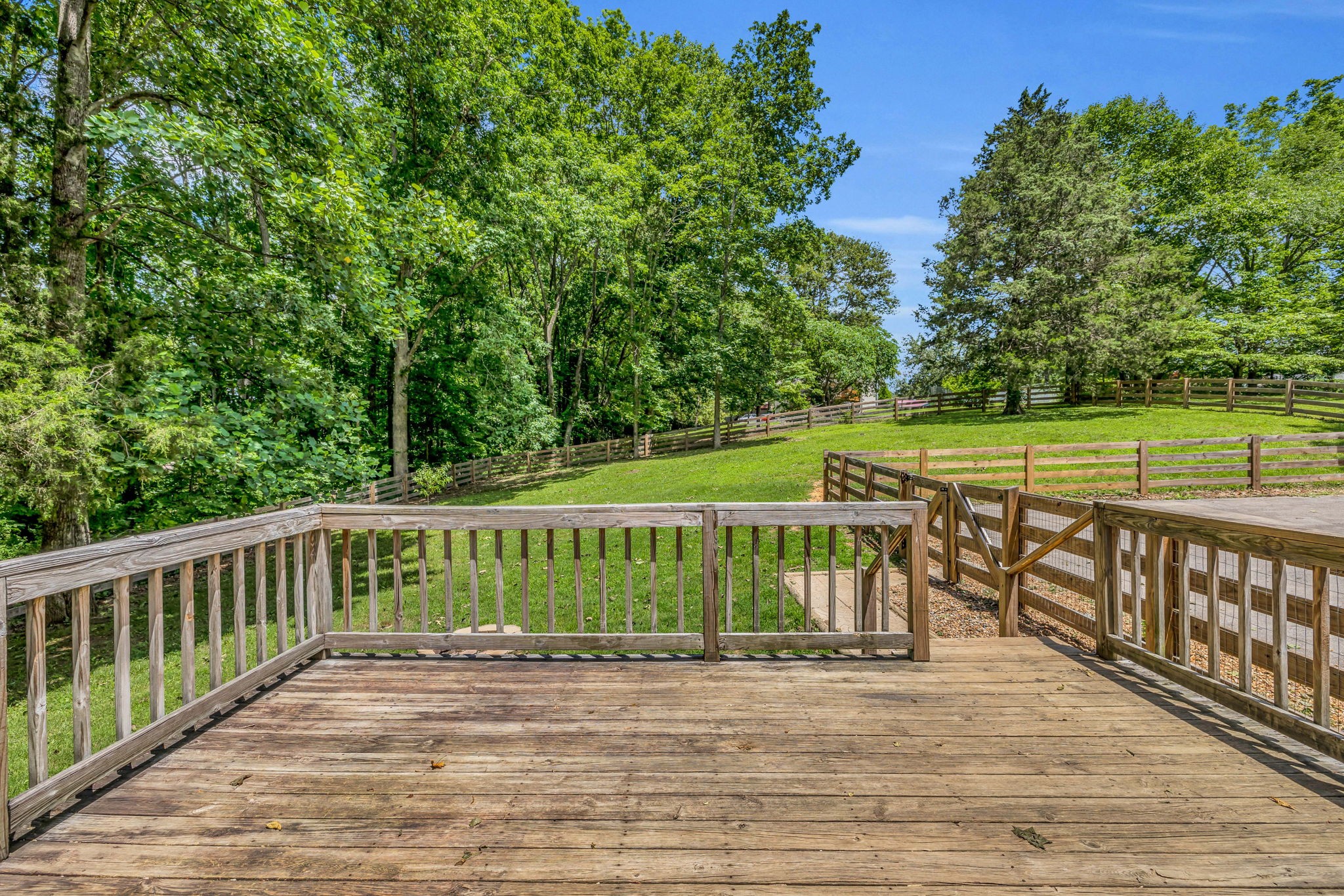 7707 Chester Road Fairview, TN 37062 - Photo 24 of 26 a view of a deck with a yard