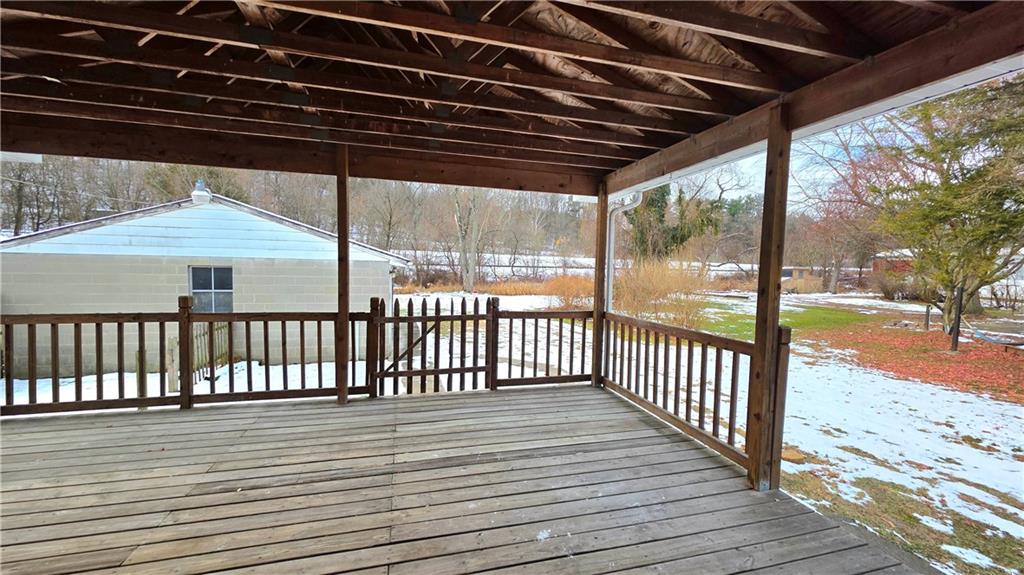 422 Beaver Street Wampum, PA 16157 - Photo 28 of 30 a view of deck with wooden floor and outdoor space
