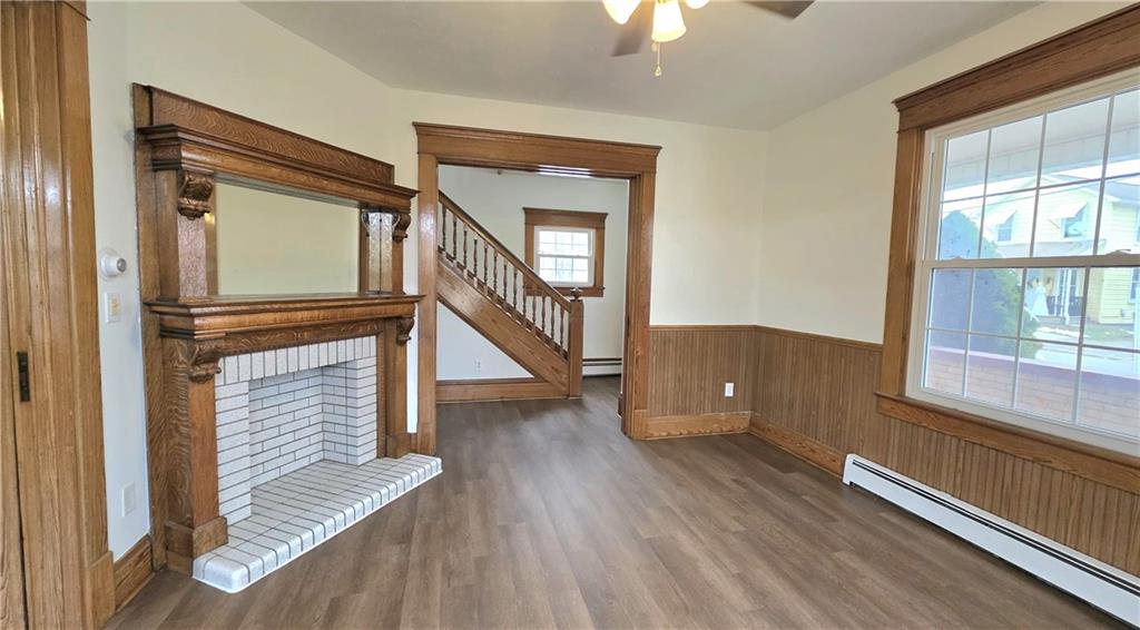 422 Beaver Street Wampum, PA 16157 - Photo 4 of 30 a view of an entryway with wooden floor and staircase