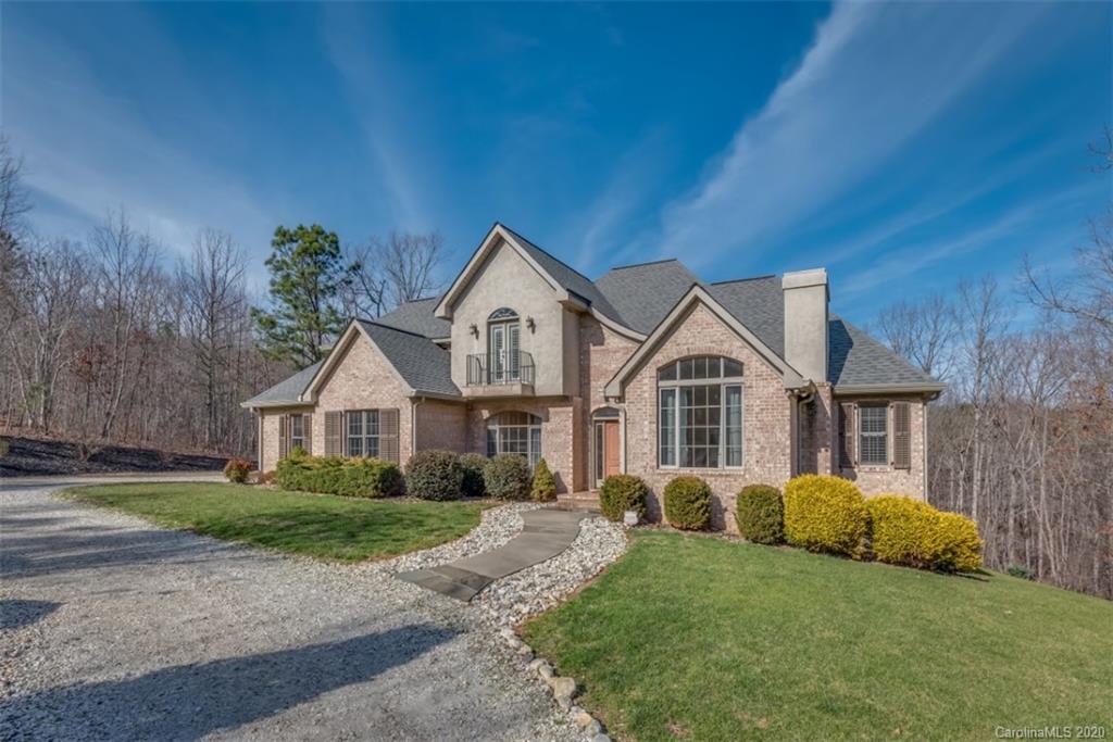 188 Timberlake Road Bostic, NC 28018 - Photo 3 of 48 a front view of a house with a garden