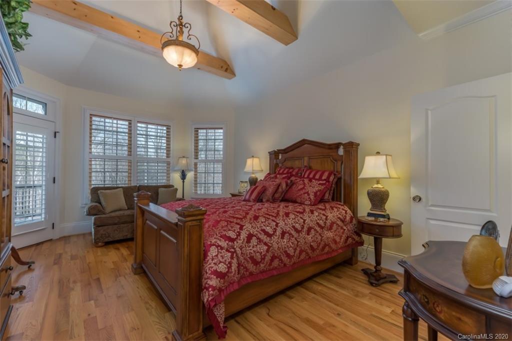 188 Timberlake Road Bostic, NC 28018 - Photo 22 of 48 a bedroom with a bed and wooden floor
