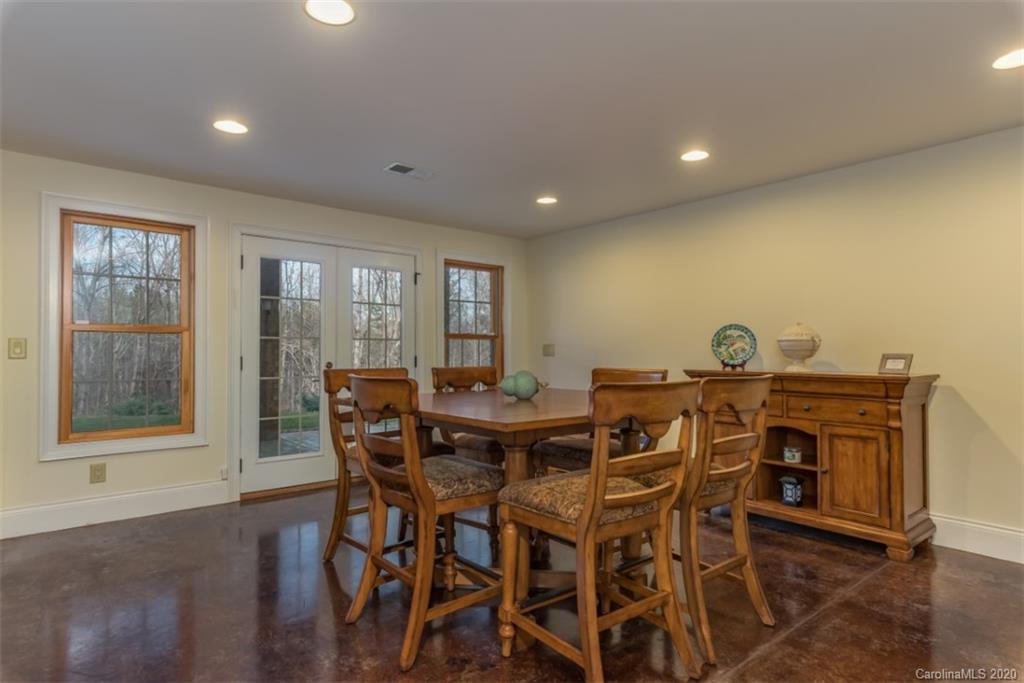 188 Timberlake Road Bostic, NC 28018 - Photo 40 of 48 a view of a dining room with furniture and wooden floor