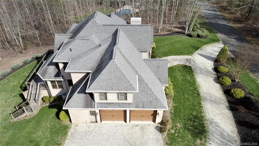 188 Timberlake Road Bostic, NC 28018 - Photo 45 of 48 an aerial view of a house with swimming pool and garden
