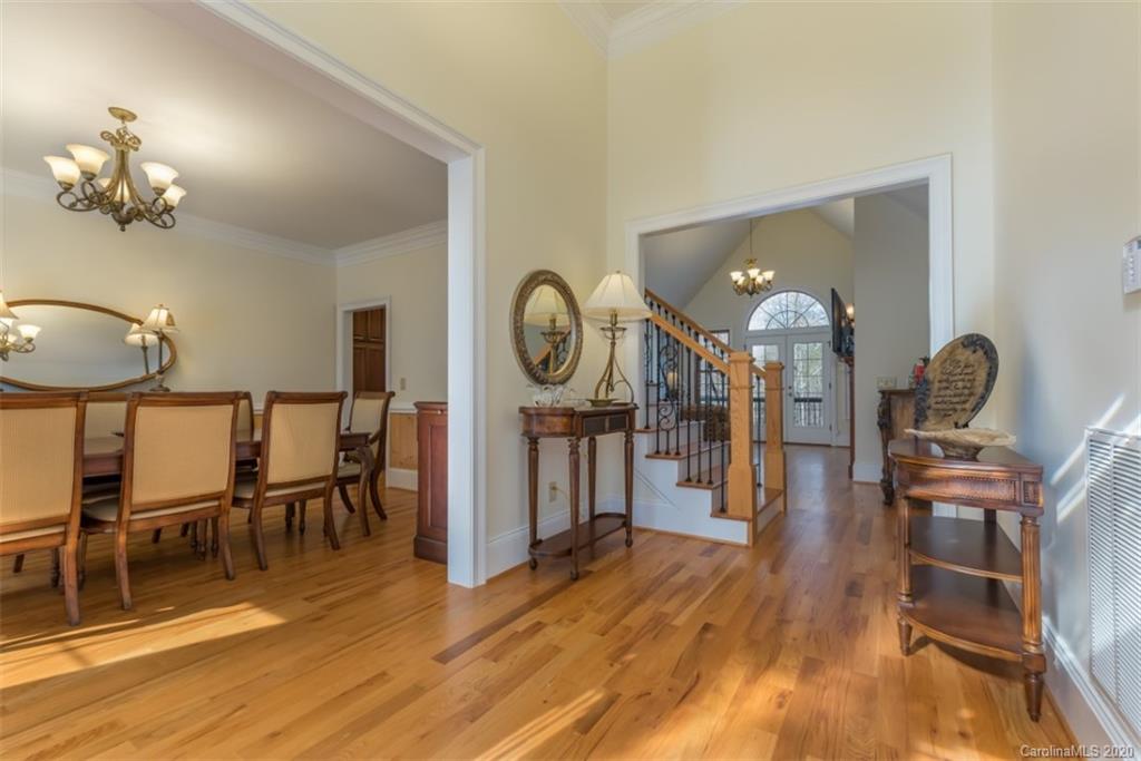 188 Timberlake Road Bostic, NC 28018 - Photo 8 of 48 a view of a dining room with furniture a chandelier and wooden floor