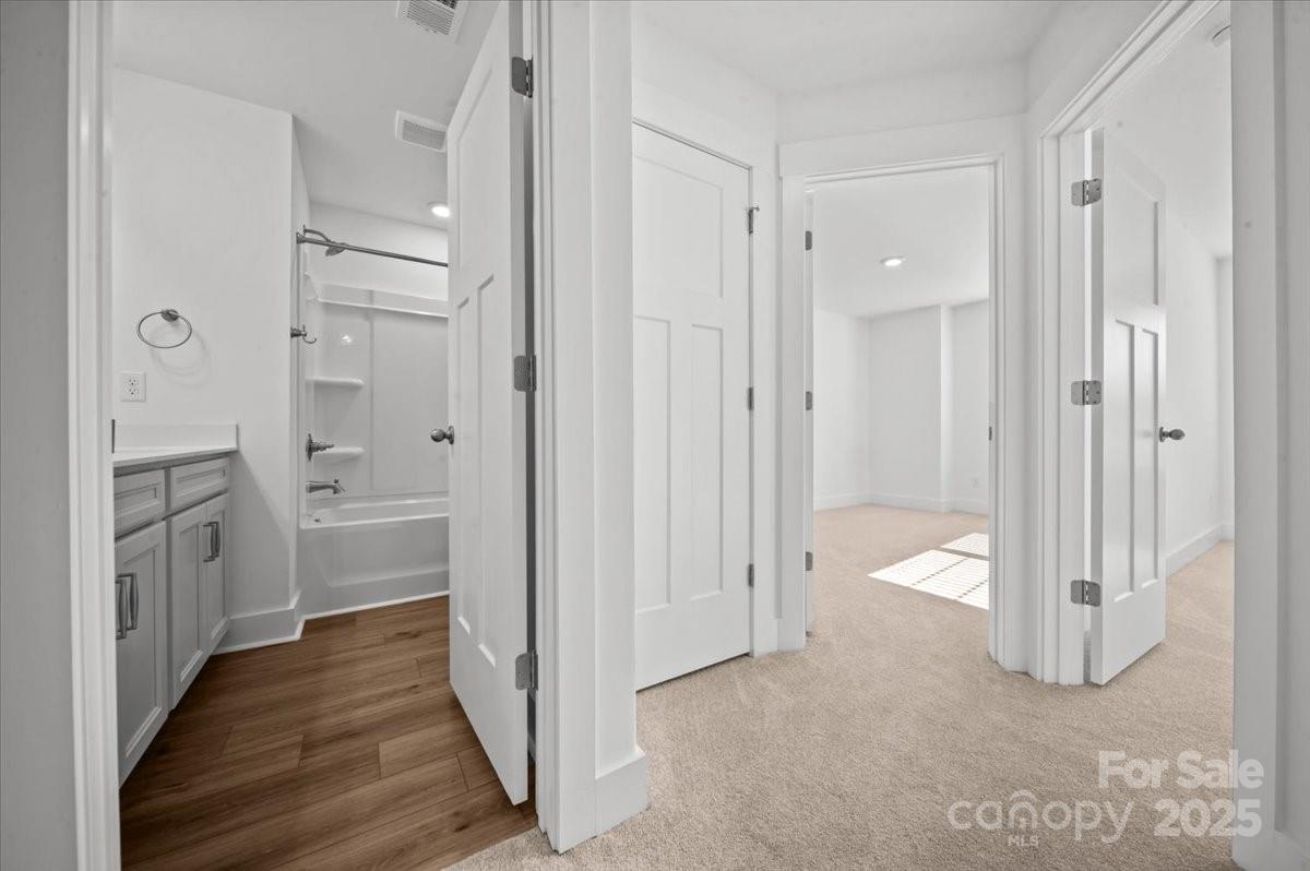 45 Moon Hvn Way Arden, NC 28704 - Photo 13 of 31 a view of a bathroom with a tub and shower