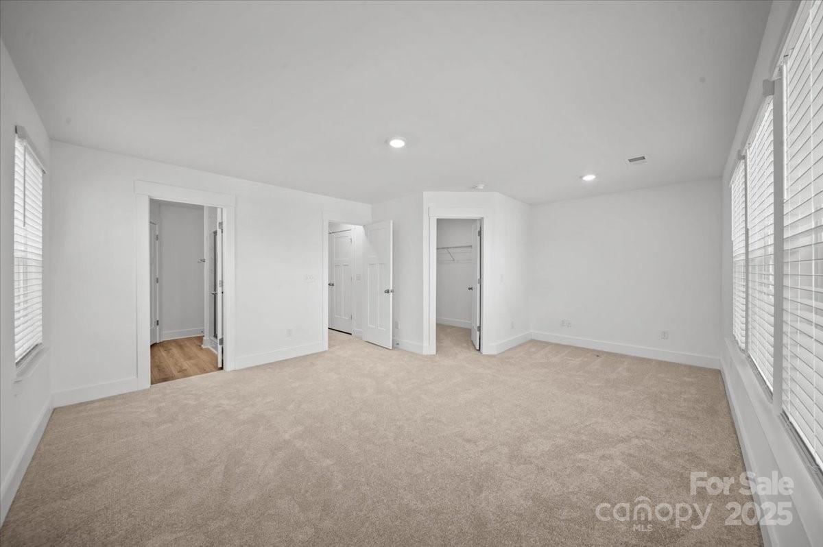 45 Moon Hvn Way Arden, NC 28704 - Photo 14 of 31 an empty room with windows and closet