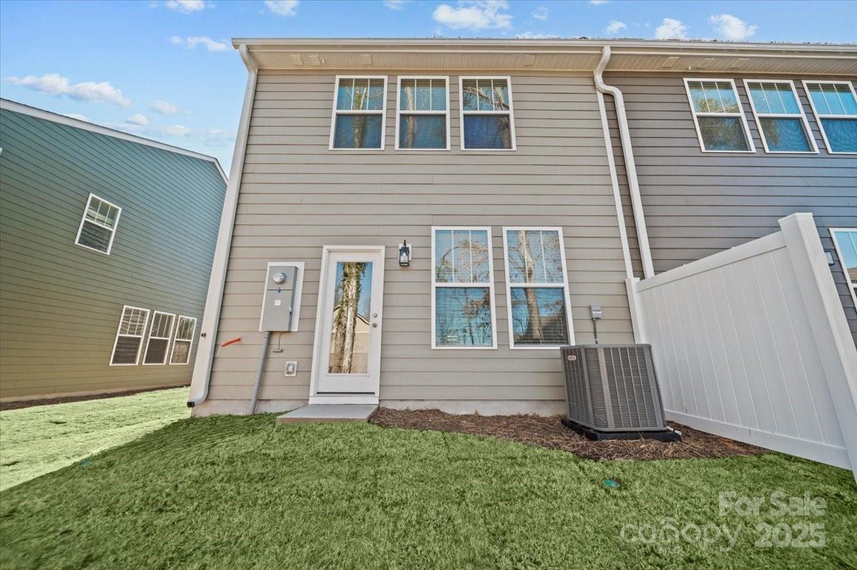 45 Moon Hvn Way Arden, NC 28704 - Photo 24 of 31 a front view of a house with a garden