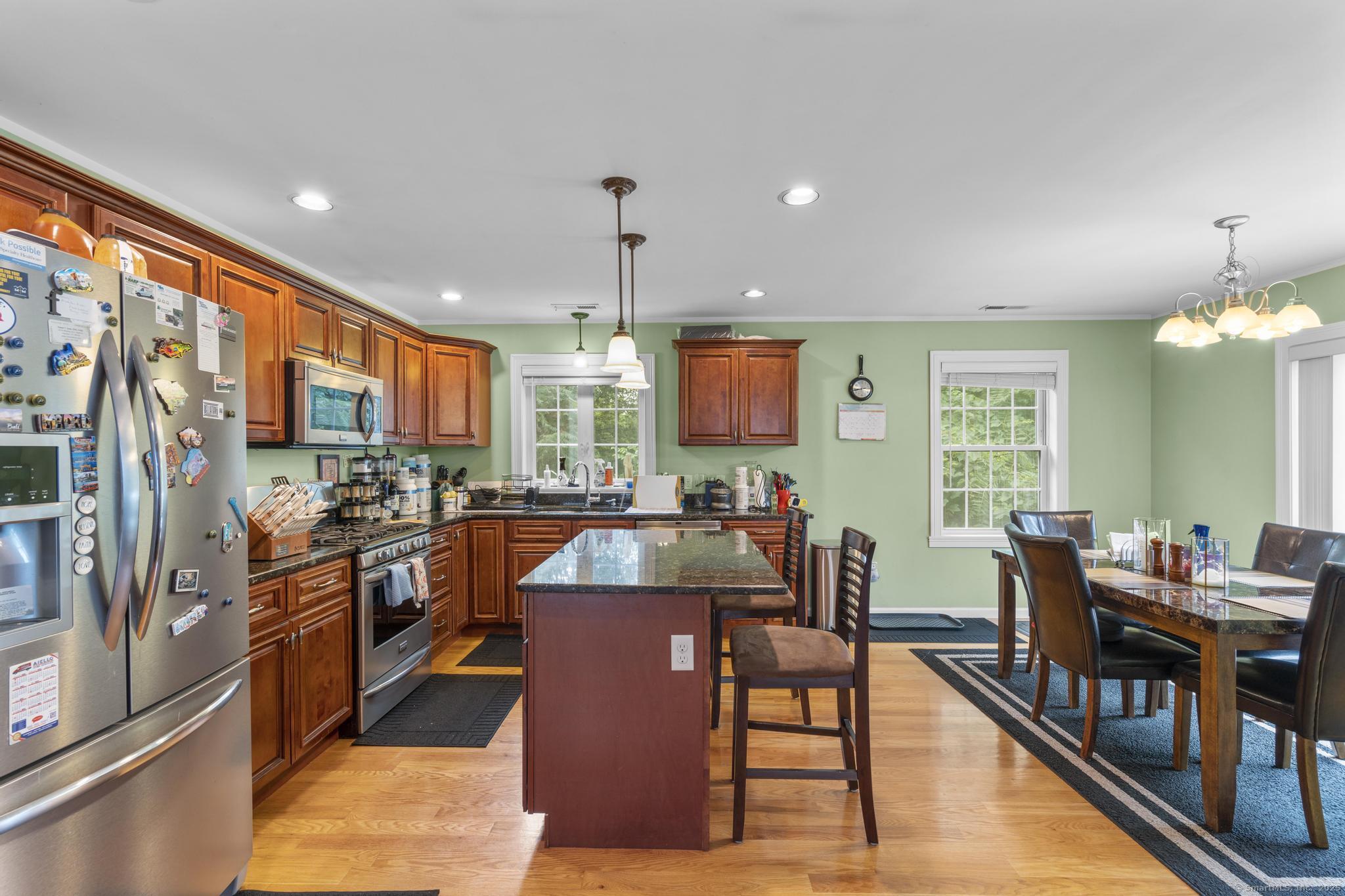 55 Allen Street New Britain, CT 06053 - Photo 22 of 40 a view of a dining room with furniture window and wooden floor