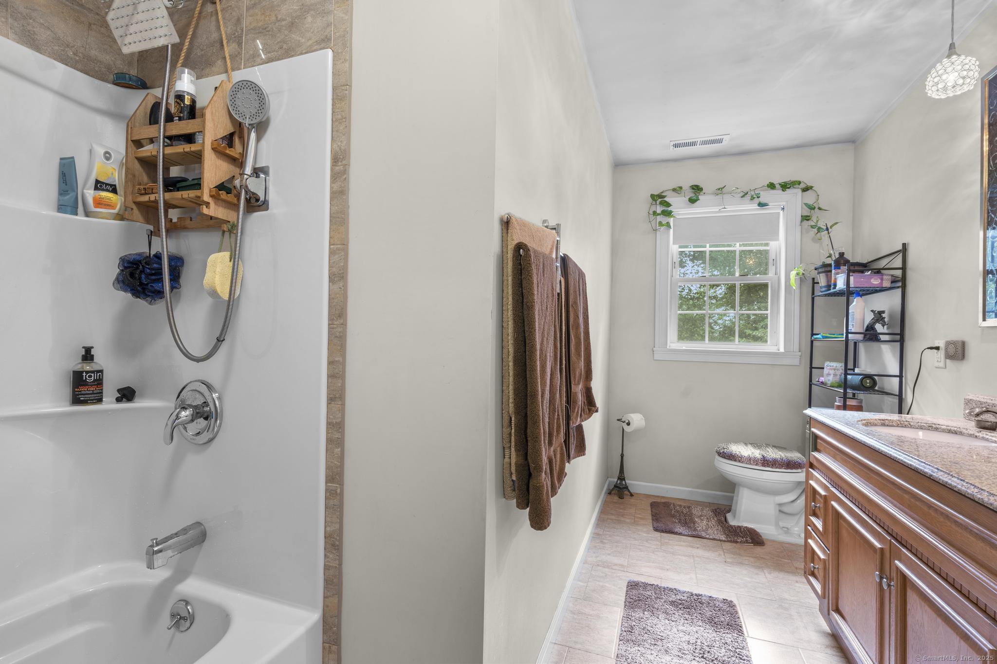 55 Allen Street New Britain, CT 06053 - Photo 30 of 40 a bathroom with a sink toilet and shower