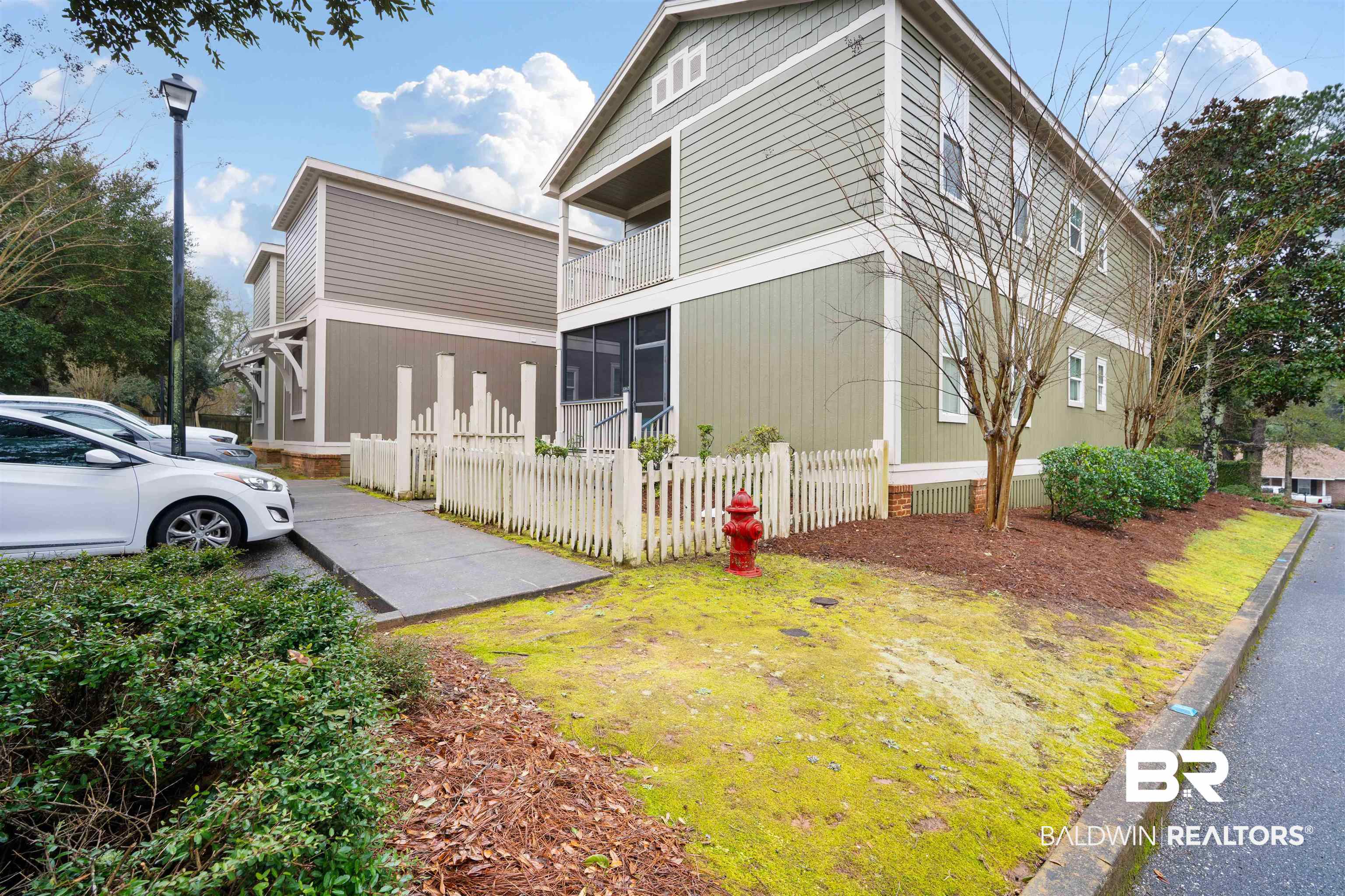 25806 Pollard Road, Unit 205 Daphne, AL 36526 - Photo 20 of 26 View of side of property featuring a balcony