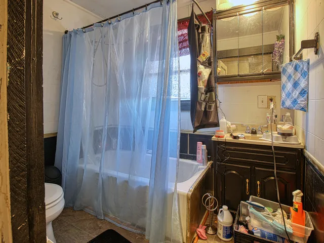 a view of a livingroom with a fan