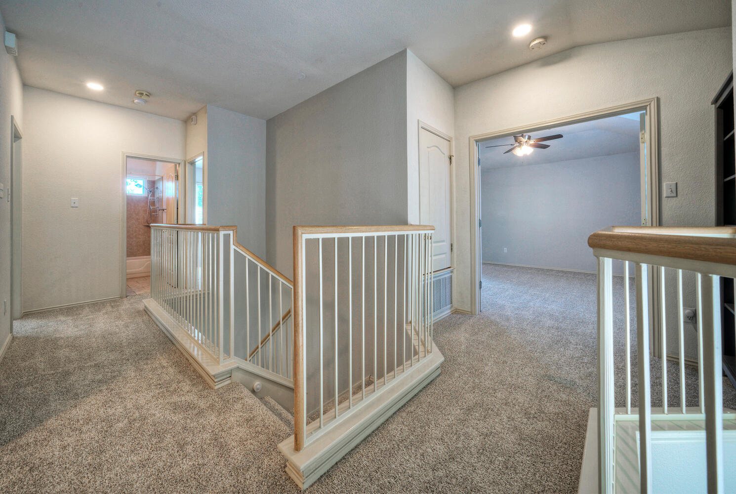 4518 Tello Path Austin, TX 78749 - Photo 13 of 26 Upstairs landing, carpet floors, and recessed lighting