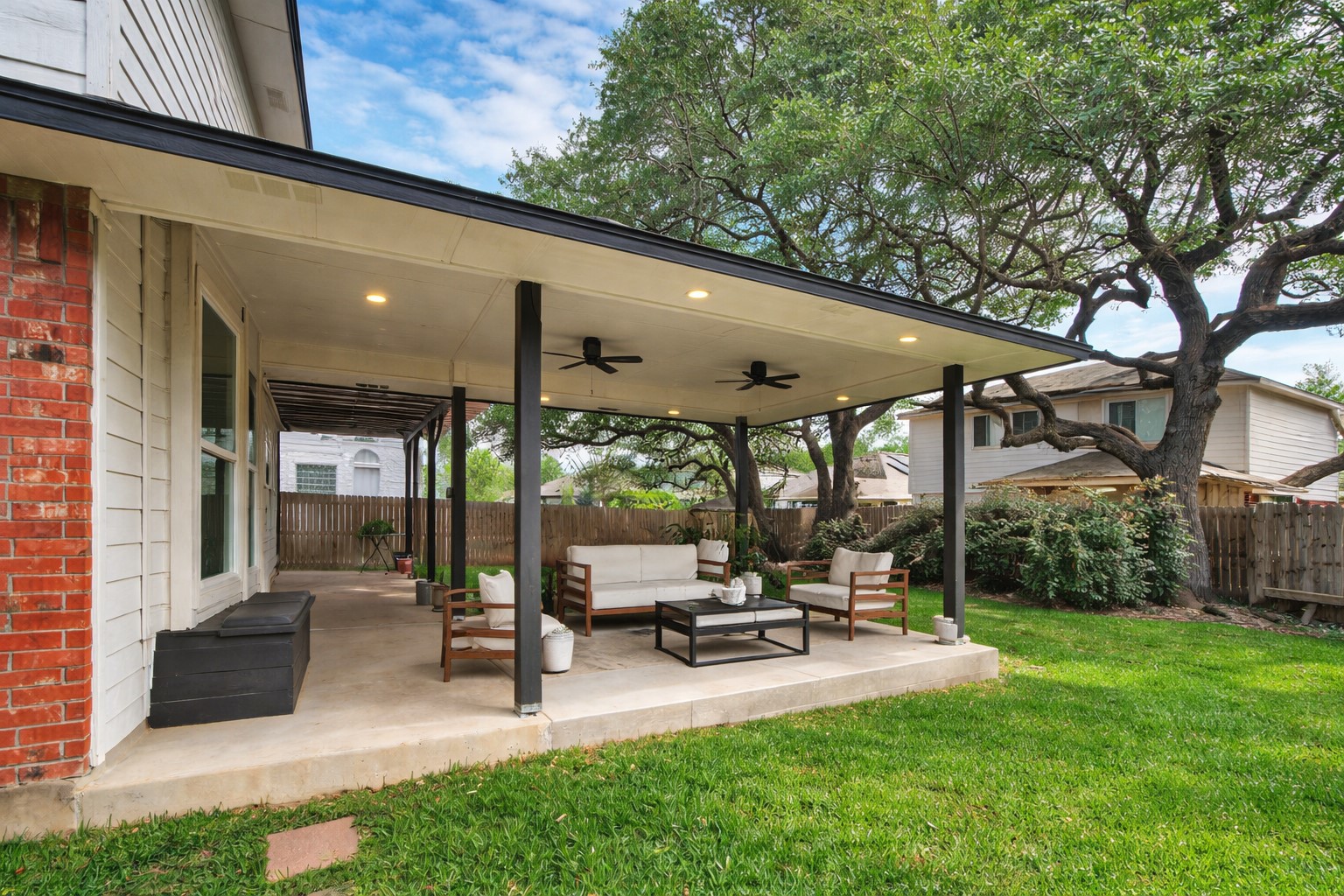 4518 Tello Path Austin, TX 78749 - Photo 24 of 26 Fenced backyard featuring ceiling fan, outdoor lounge area, and a patio