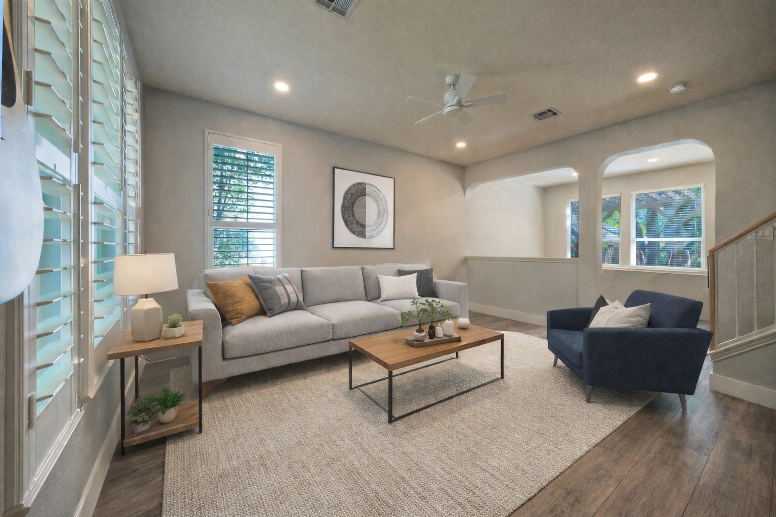 4518 Tello Path Austin, TX 78749 - Photo 3 of 26 Ai - Living room with a ceiling fan, wood finished floors, recessed lighting, and arched walkways