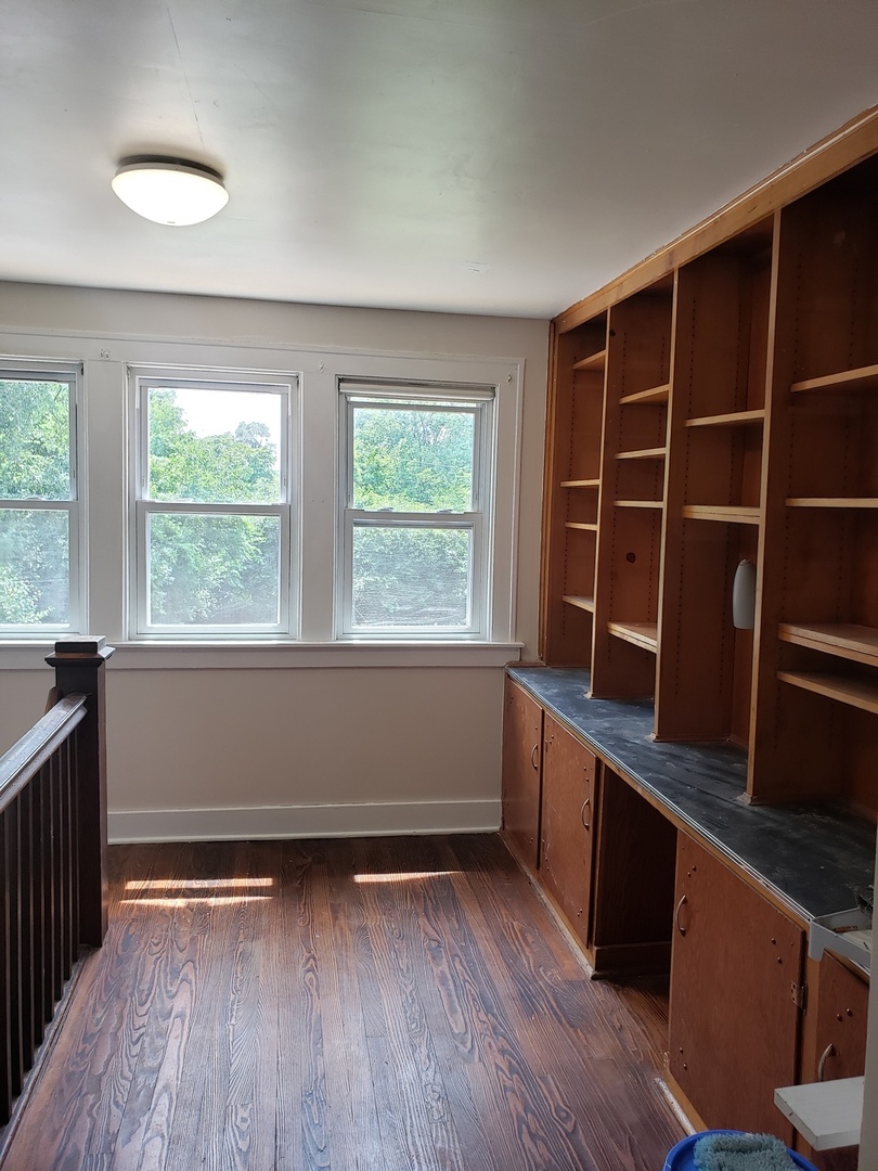 1917 Cedar Road Homewood, IL 60430 - Photo 11 of 20 wooden floor in an empty room with a window