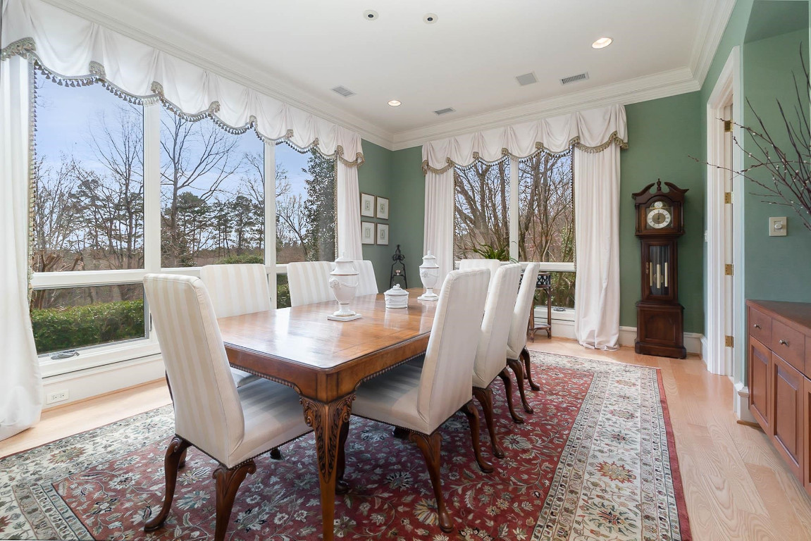 24107 Cherry Drive Chapel Hill, NC 27517 - Photo 11 of 46 a view of a dining room with furniture window and outside view