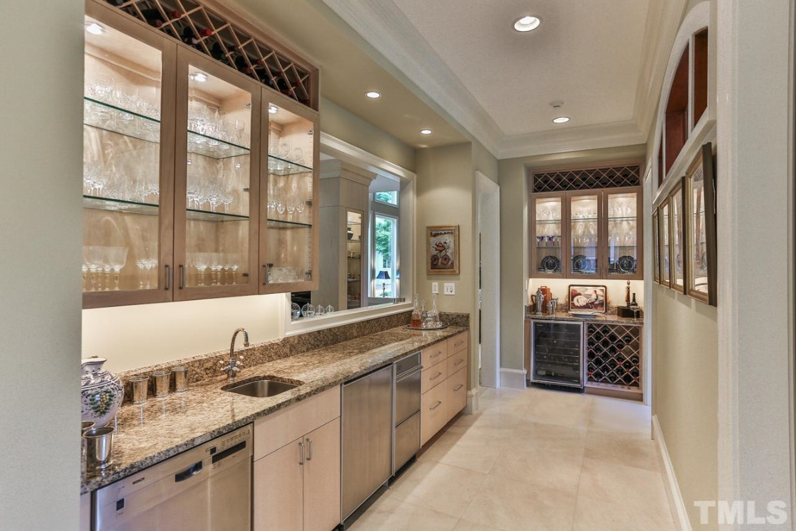 24107 Cherry Drive Chapel Hill, NC 27517 - Photo 13 of 46 a large white kitchen with a large window