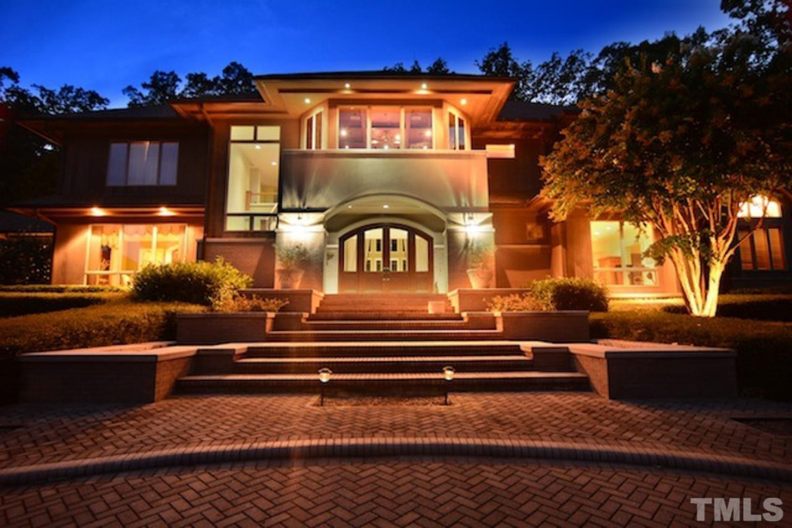 24107 Cherry Drive Chapel Hill, NC 27517 - Photo 2 of 46 a view of a building with a balcony