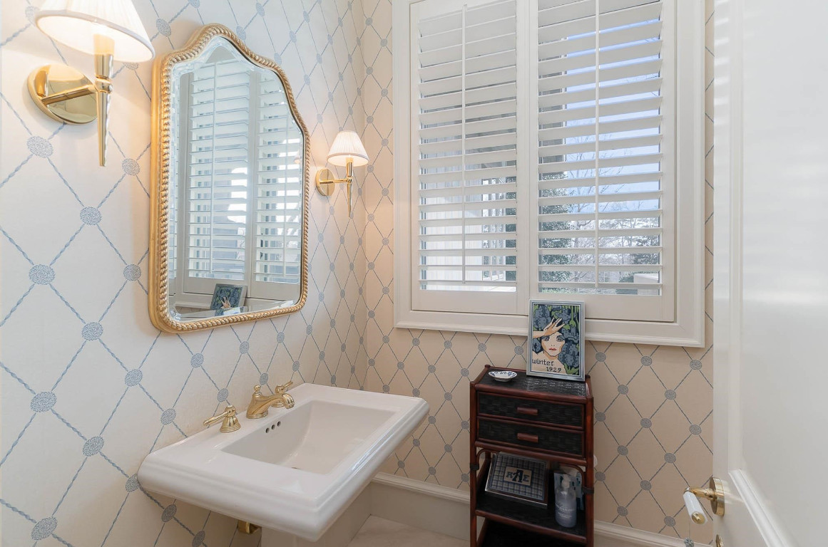 24107 Cherry Drive Chapel Hill, NC 27517 - Photo 21 of 46 a bathroom with a sink a vanity and a bathtub