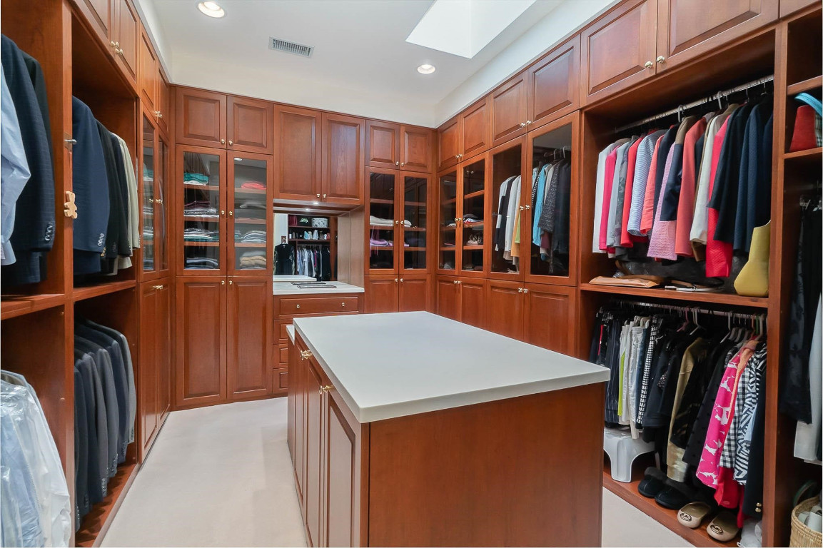 24107 Cherry Drive Chapel Hill, NC 27517 - Photo 29 of 46 a view of walk in closet with clothes and shoes