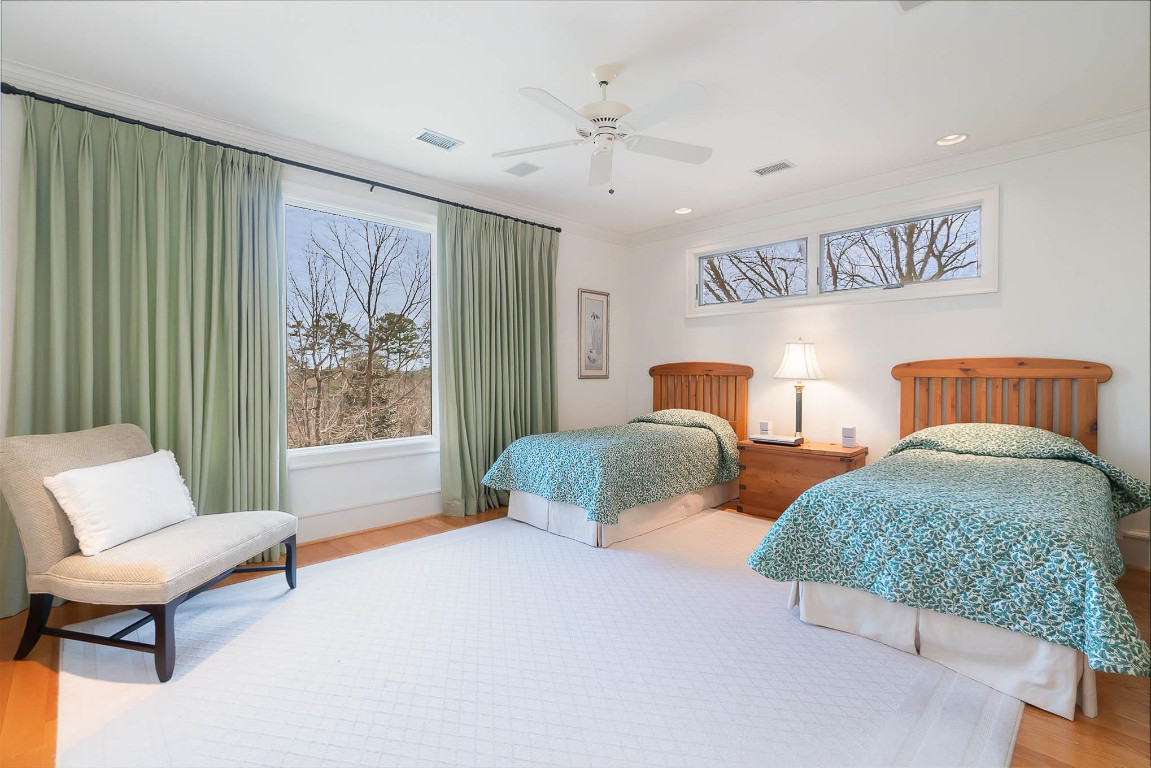 24107 Cherry Drive Chapel Hill, NC 27517 - Photo 37 of 46 a bedroom with two beds and a large window