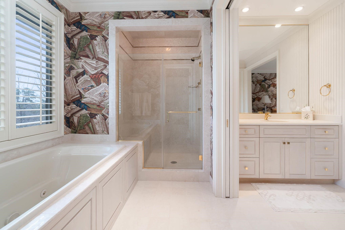 24107 Cherry Drive Chapel Hill, NC 27517 - Photo 40 of 46 a bathroom with a bathtub and a sink