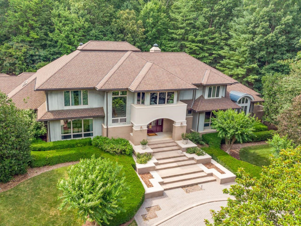 24107 Cherry Drive Chapel Hill, NC 27517 - Photo 4 of 46 a front view of a house with a yard