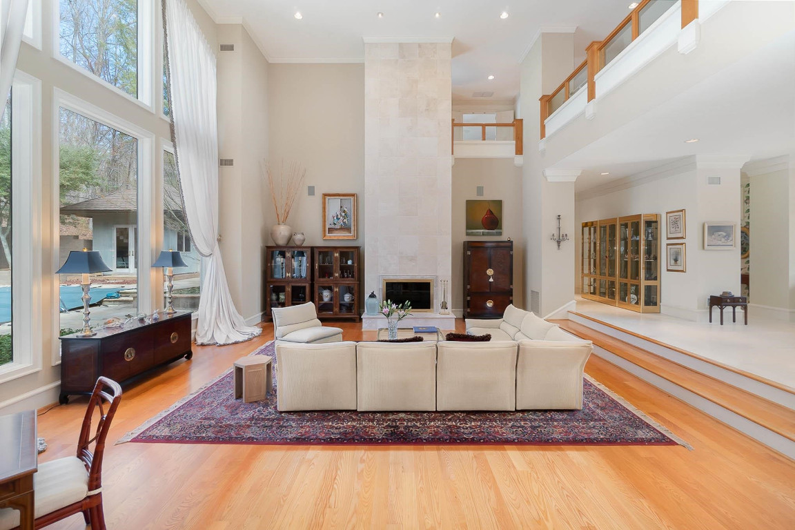 24107 Cherry Drive Chapel Hill, NC 27517 - Photo 8 of 46 a living room with fireplace furniture and a rug
