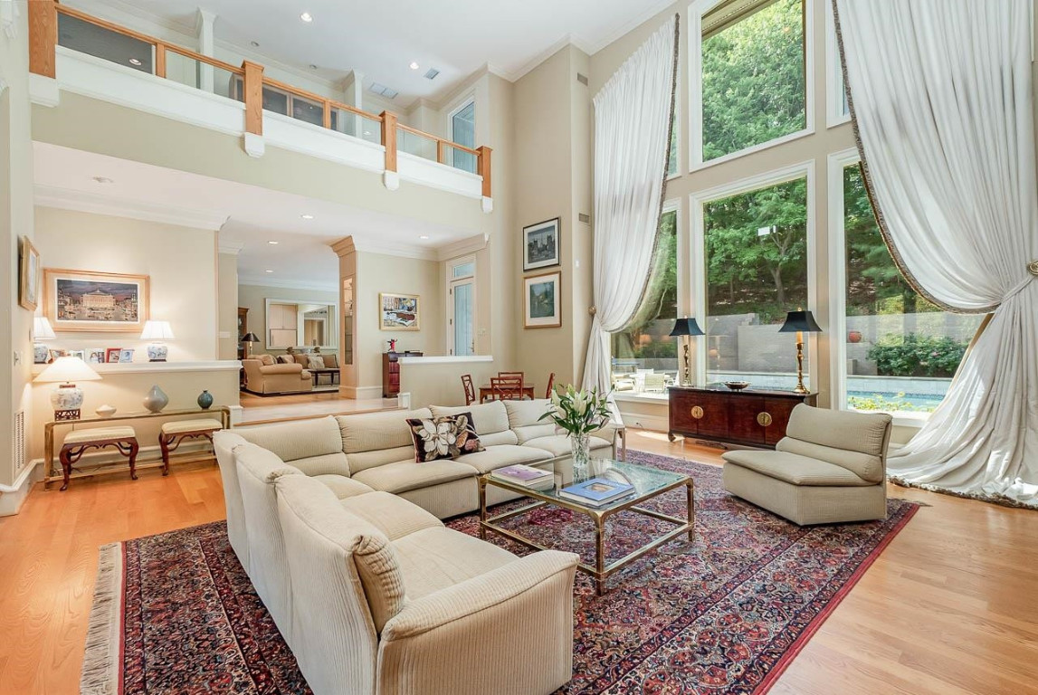 24107 Cherry Drive Chapel Hill, NC 27517 - Photo 9 of 46 a living room with fireplace furniture and a large window