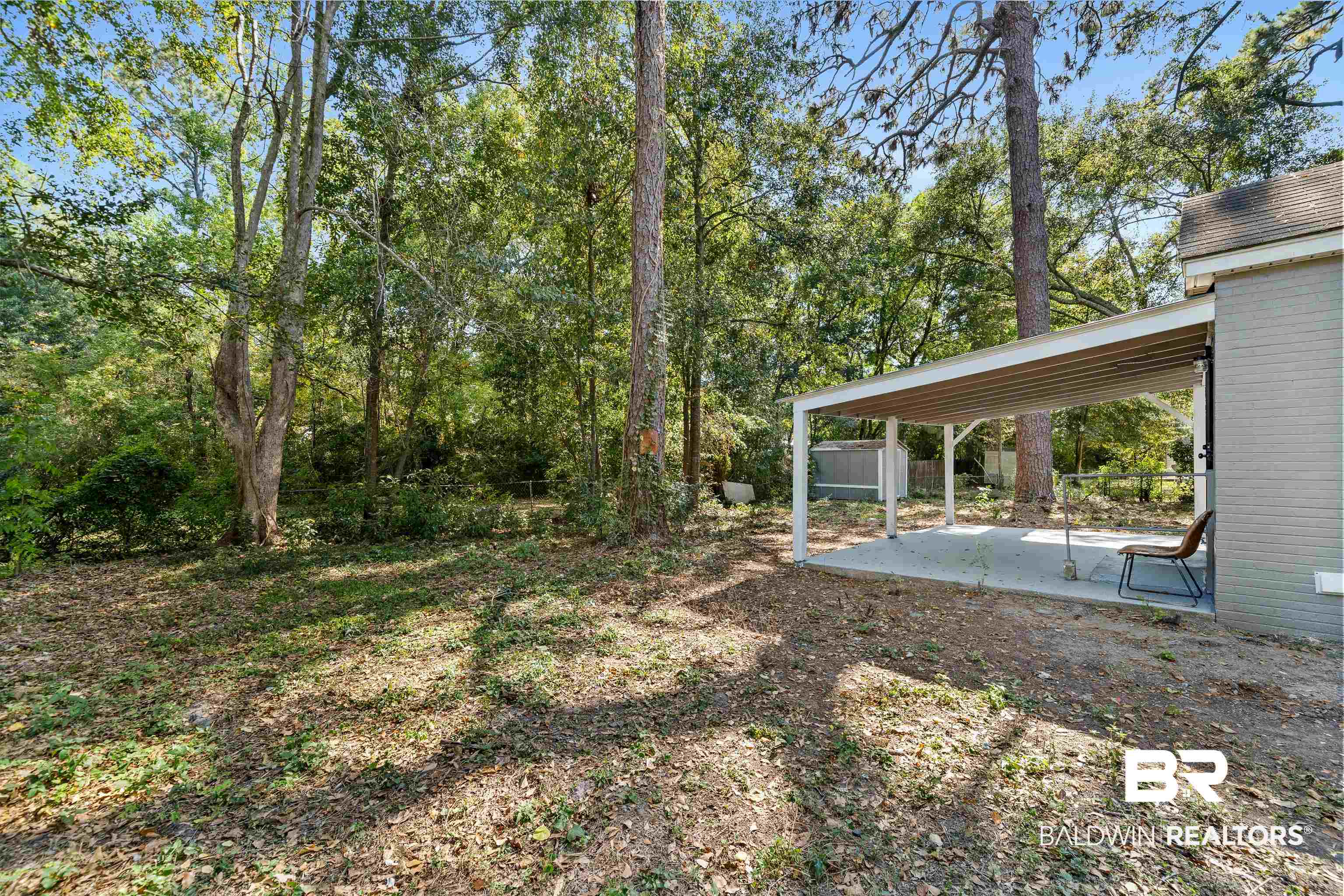 611 Morgan Avenue Mobile, AL 36606 - Photo 21 of 24 View of yard featuring a patio and a carport