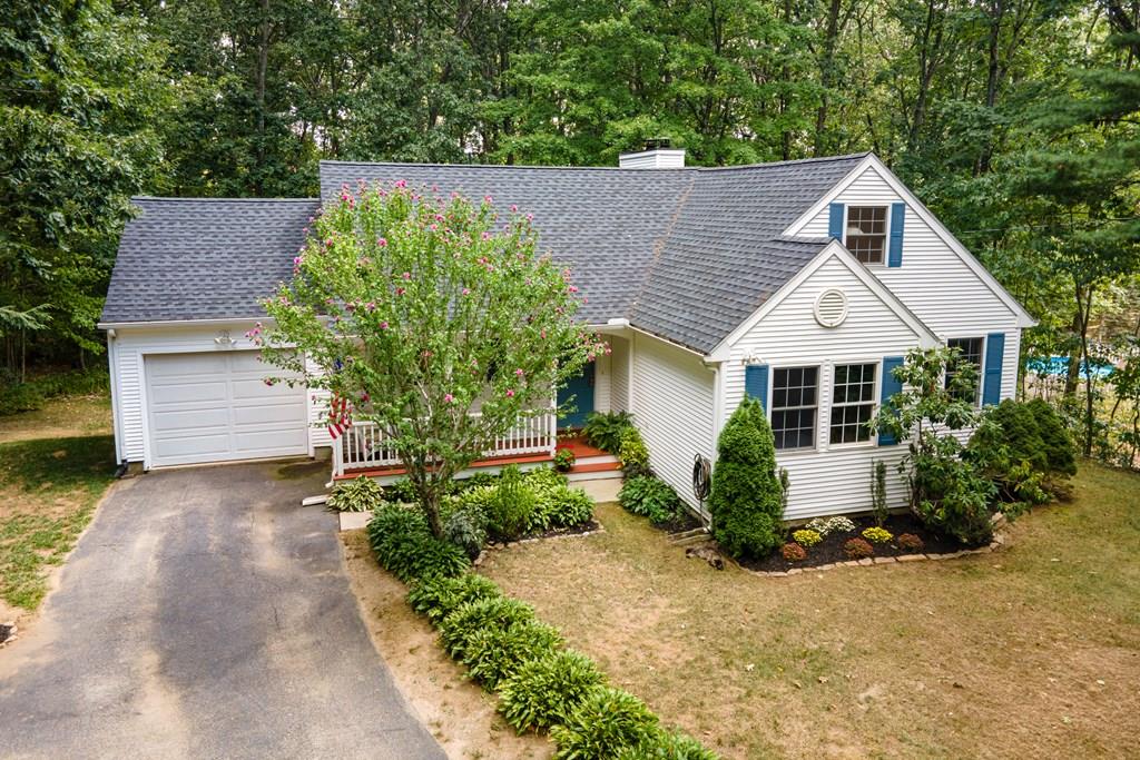 101 Shepard Road Sturbridge, MA 01566 - Photo 1 of 42 a front view of a house with garden