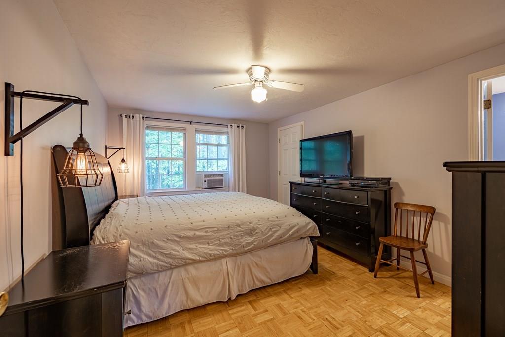101 Shepard Road Sturbridge, MA 01566 - Photo 12 of 42 a bed room with a bed television and a window