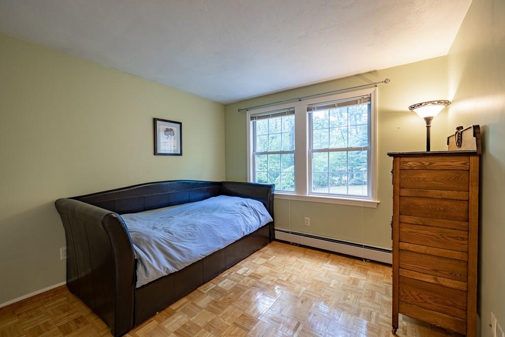 101 Shepard Road Sturbridge, MA 01566 - Photo 14 of 42 a bedroom with a bed and a window
