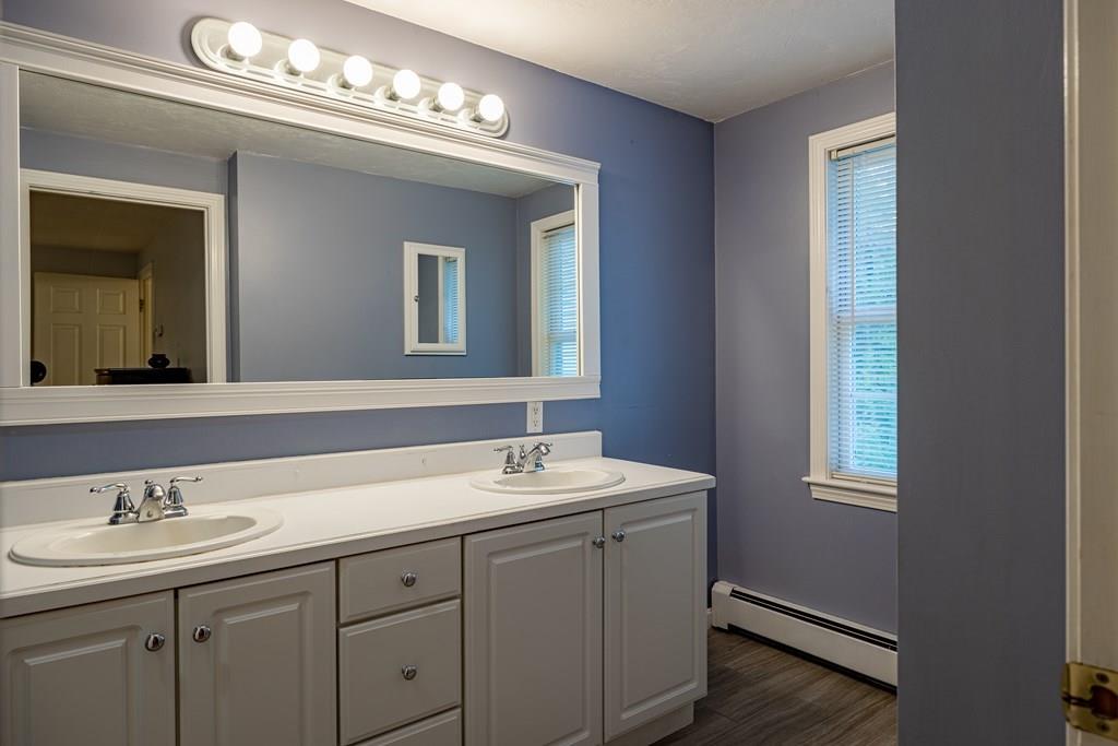 101 Shepard Road Sturbridge, MA 01566 - Photo 16 of 42 a bathroom with 2 sink and a mirror
