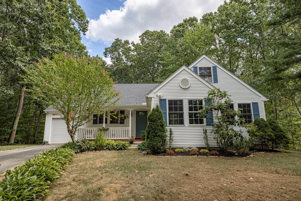 101 Shepard Road Sturbridge, MA 01566 - Photo 38 of 42 a front view of a house with a yard and garage