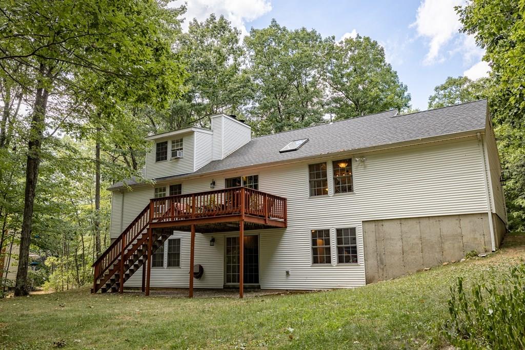 101 Shepard Road Sturbridge, MA 01566 - Photo 41 of 42 front view of a house with a yard