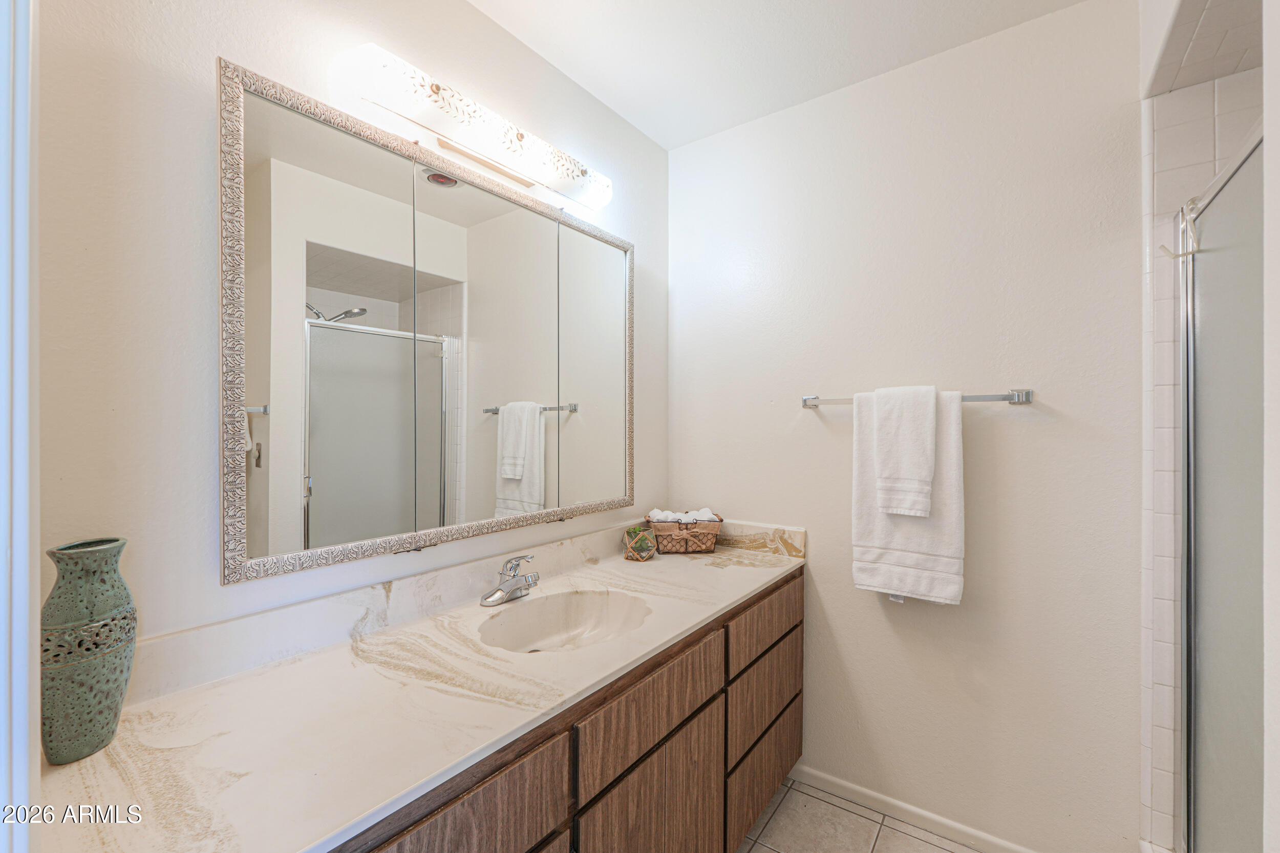 730 South Portland Mesa, AZ 85206 - Photo 26 of 54 a bathroom with a sink and a mirror