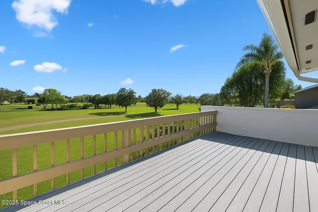 a view of balcony with deck and outdoor space